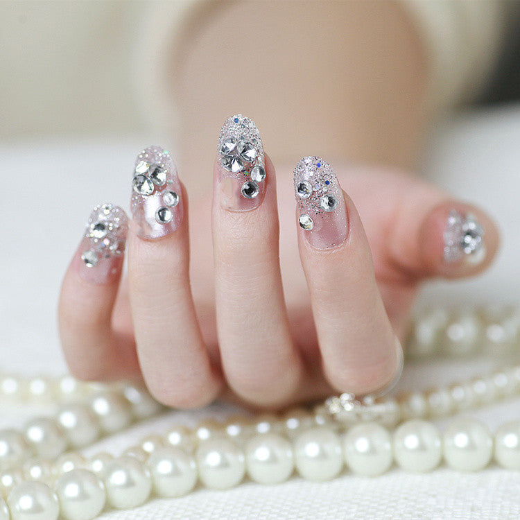 Sparkling artificial nails with rhinestones and sparkling accents Kalsten