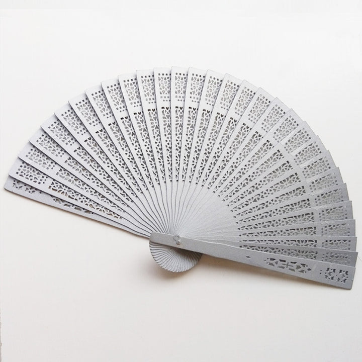 Ladies elegant fan made of high-quality plastic with artistic cutouts Kalsten