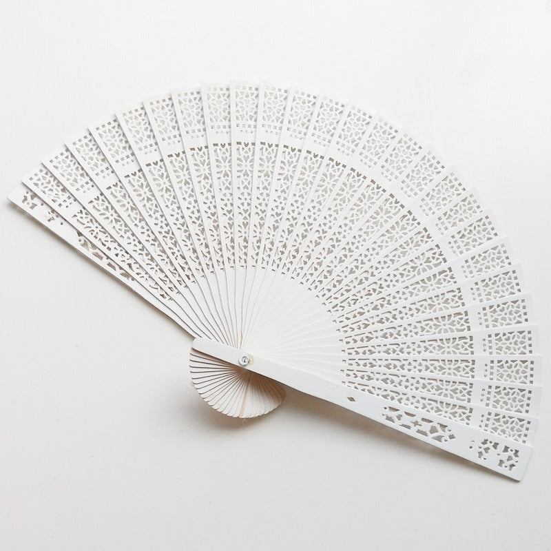 Ladies fan with intricate patterns and elegant laser engraving Kalsten