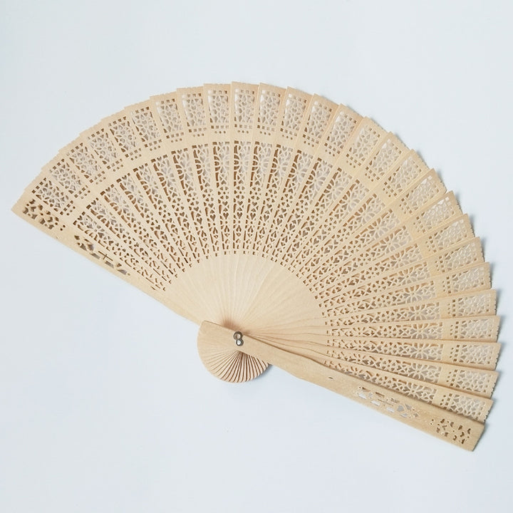 Ladies fan with intricate patterns and elegant laser engraving Kalsten