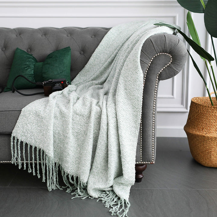 Throw blanket and plaid with herringbone structure, soft cotton blend and decorative fringes Kalsten