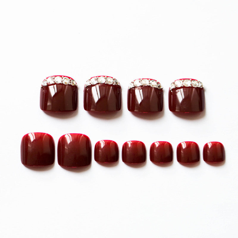 Artful toenails with elegant rhinestone decorations Kalsten