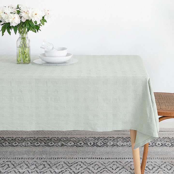 Tablecloth made of cotton blend with embossed square and circle relief Kalsten