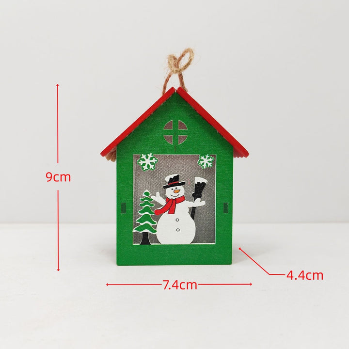 Illuminated wooden house for Christmas decoration