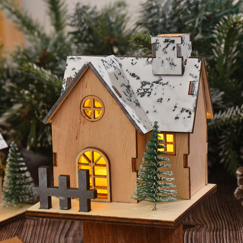 Illuminated wooden Christmas house with LED