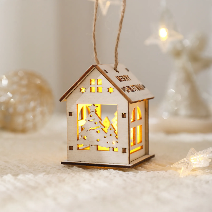Illuminated wooden house as Christmas decoration