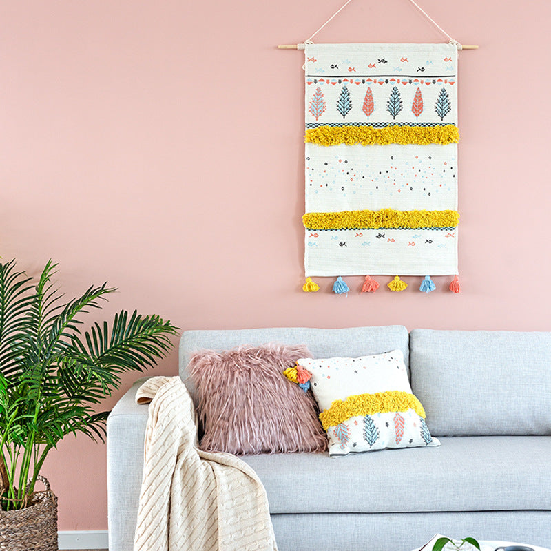 Wall tapestry in Scandi-Boho style with tufting stripes, tassels, and wooden rod Kalsten