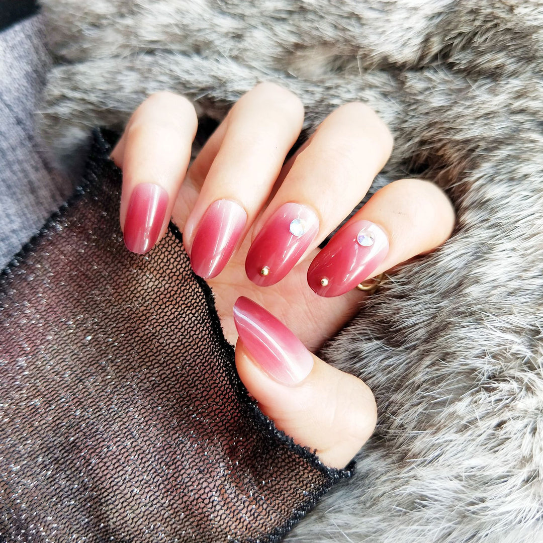 Artificial nails with elegant ombre effect and rhinestone decorations Kalsten