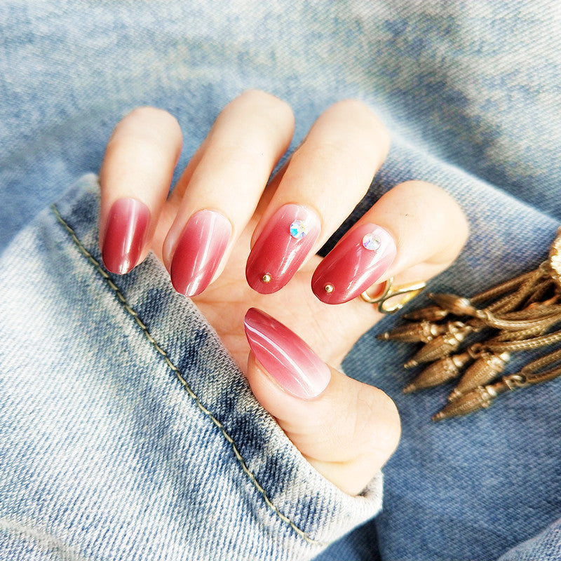 Artificial nails with elegant ombre effect and rhinestone decorations Kalsten