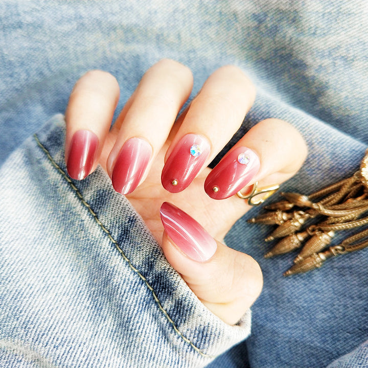 Artificial nails with elegant ombre effect and rhinestone decorations Kalsten