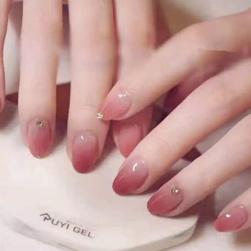 Artificial nails with elegant ombre effect and rhinestone decorations Kalsten