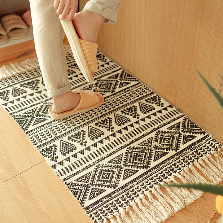 Flat-woven cotton blend runner with ethnic diamond jacquard and fringes Kalsten