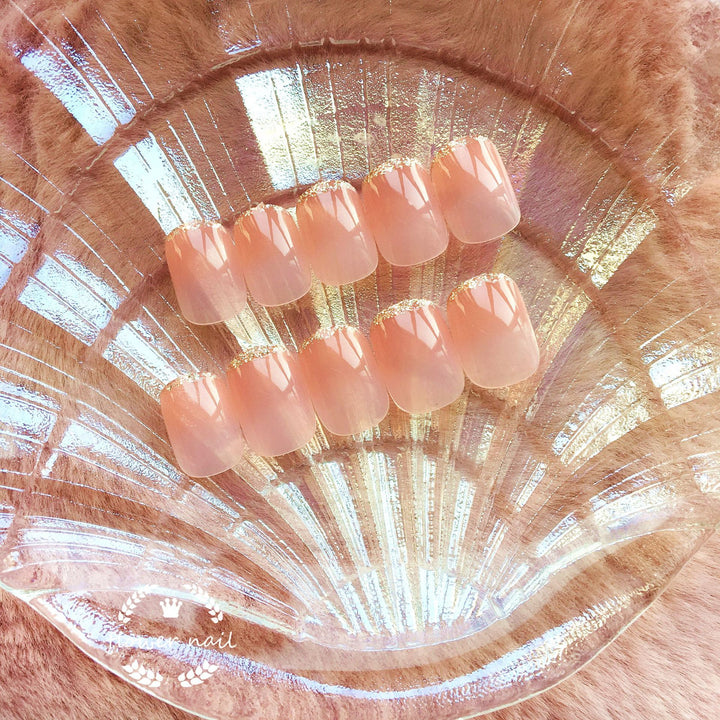 Artificial nails with glitter accents and natural finish Kalsten