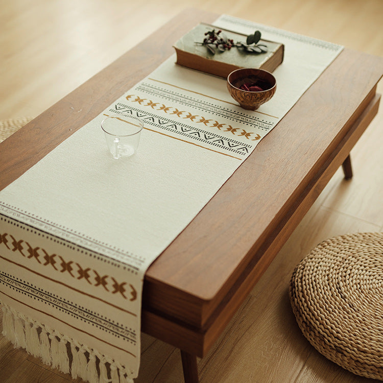 Woven Boho table runner made of cotton blend with decorative fringes and graphic stripe pattern Kalsten
