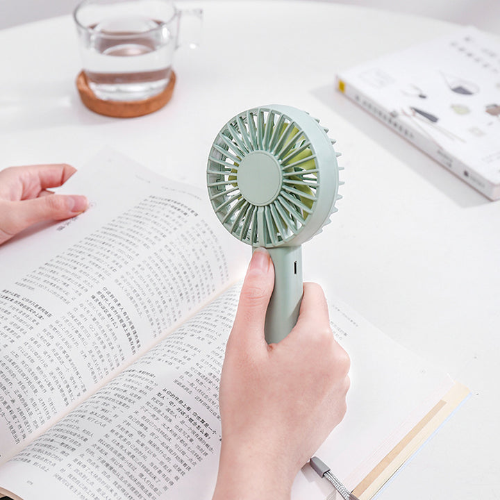 Unisex nan compact portable hand fan with rechargeable battery and USB charging port quiet operation self-standing Kalsten