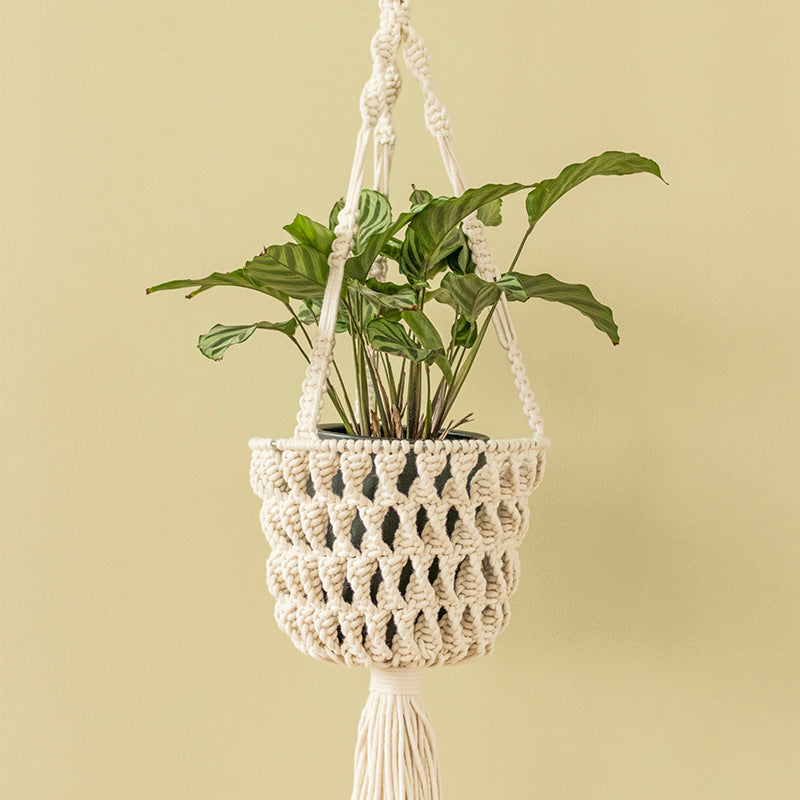 Macrame plant hanger made of cotton rope with tassels and adjustable suspension Kalsten
