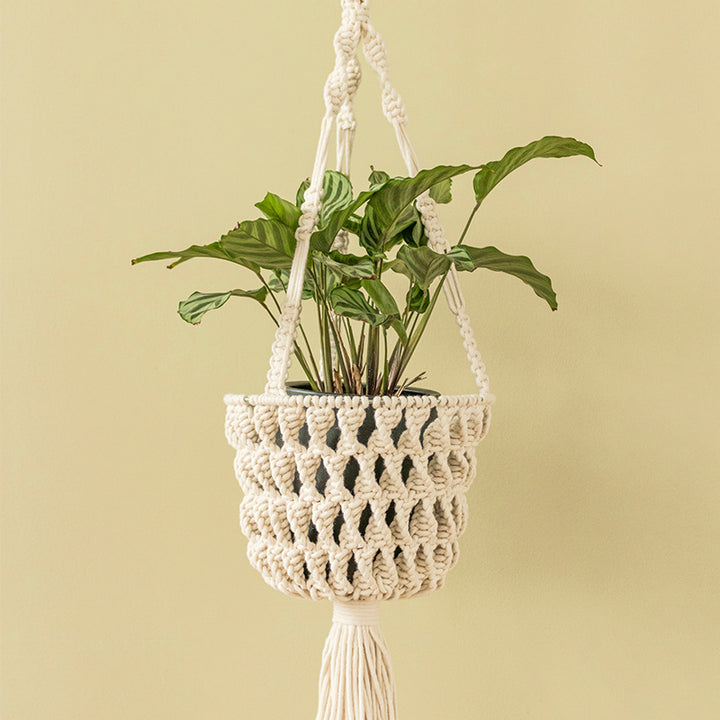 Macrame plant hanger made of cotton rope with tassels and adjustable suspension Kalsten