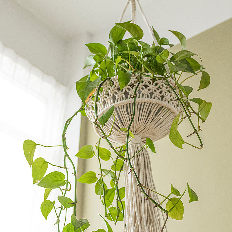 Macrame plant hanger made of cotton rope with tassels and adjustable suspension Kalsten