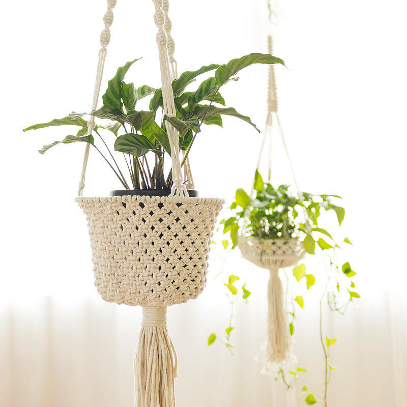 Macrame plant hanger made of cotton rope with tassels and adjustable suspension Kalsten