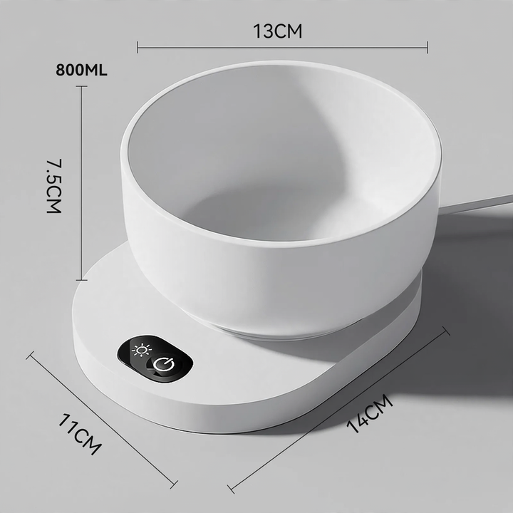 Heated drinking and feeding bowl for pets