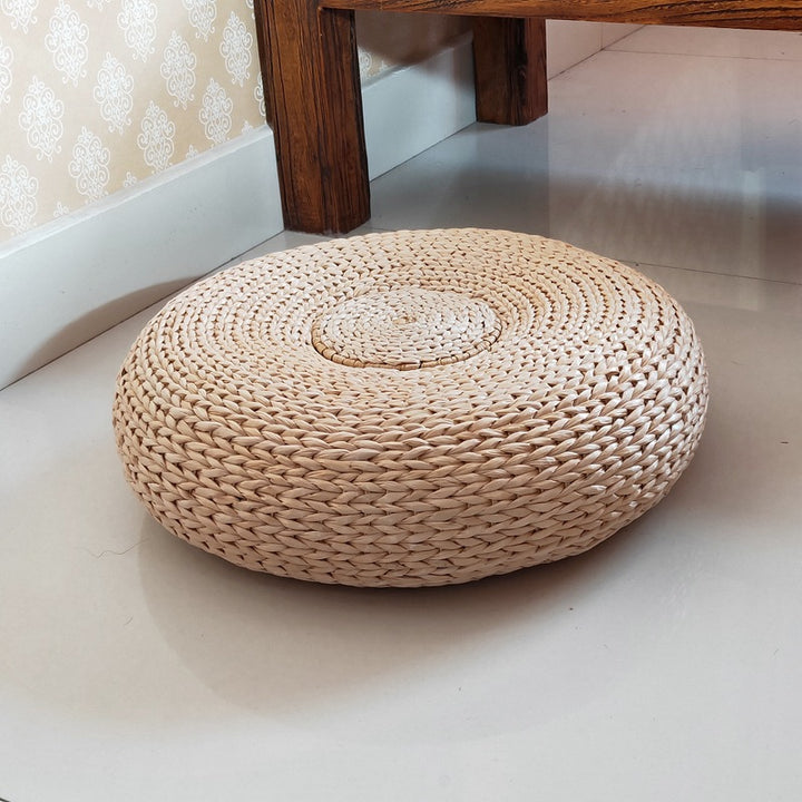 Handcrafted sitting pouf made of natural material Kalsten