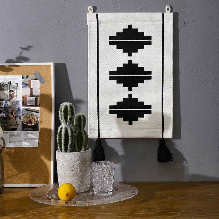 Woven wall hanging with graphic ethnic relief and tassels Kalsten