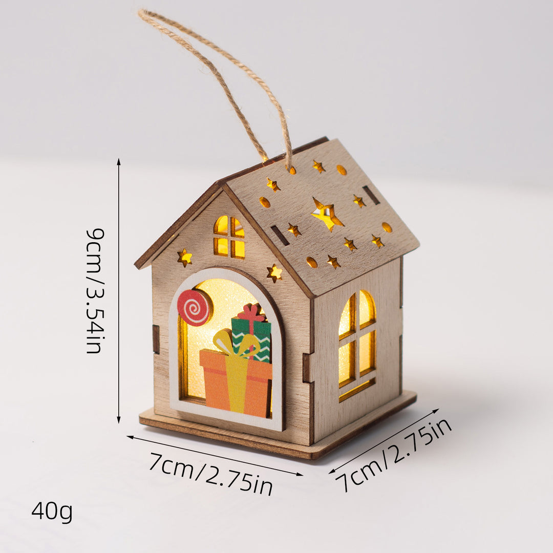 Illuminated wooden house as Christmas decoration