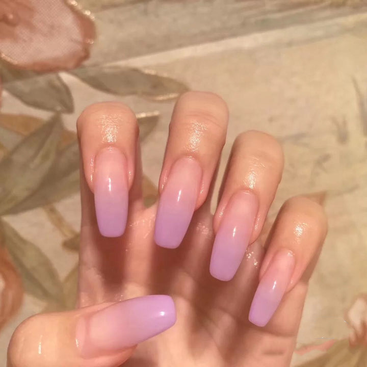 Artificial nails in modern French Tip design Kalsten