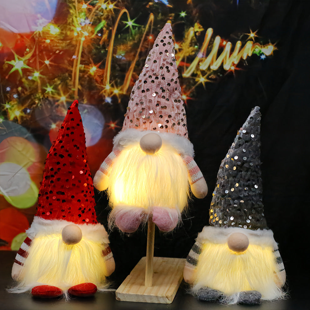 Lighted Christmas elf figure with sequin hat