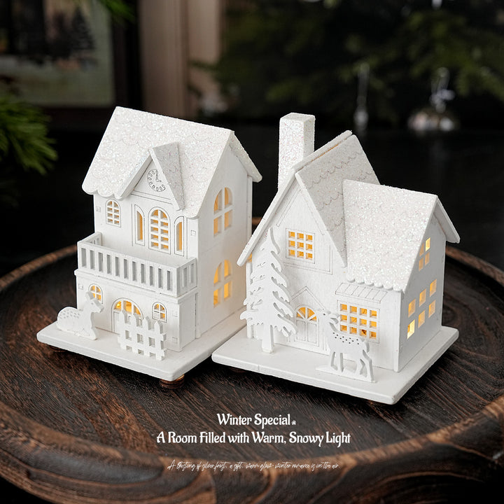 Illuminated wooden house for Christmas decoration