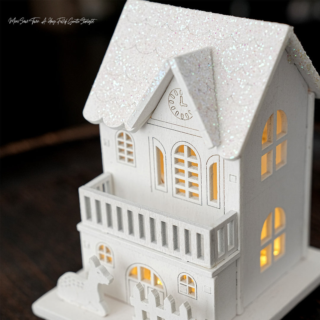 Illuminated wooden house for Christmas decoration