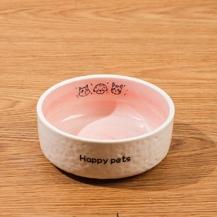 Heated drinking and feeding bowl for pets