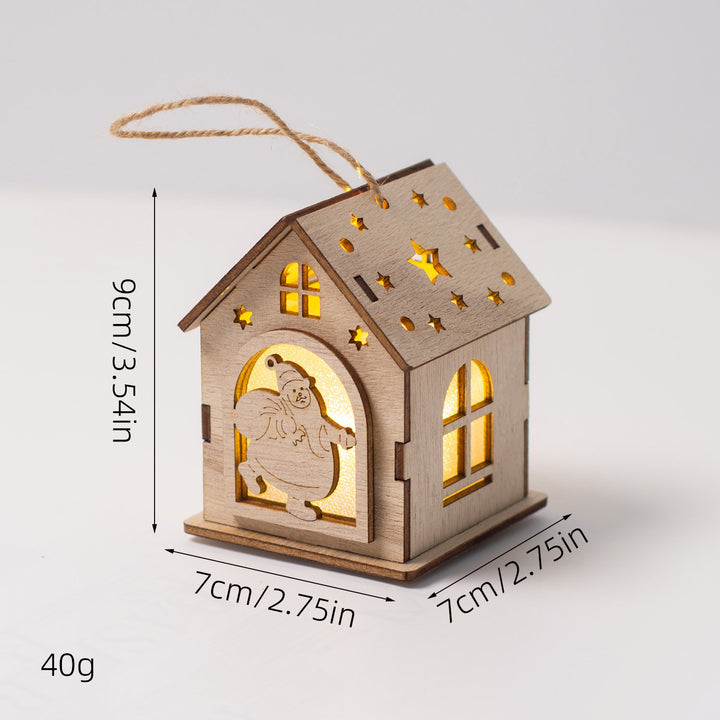 Illuminated wooden house as Christmas decoration
