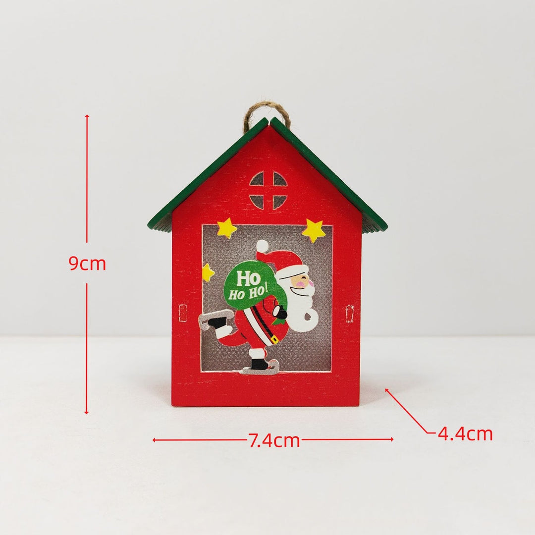 Illuminated wooden house for Christmas decoration