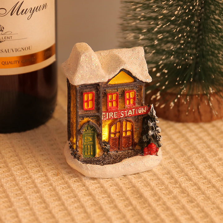 Illuminated houses made of resin for Christmas decoration