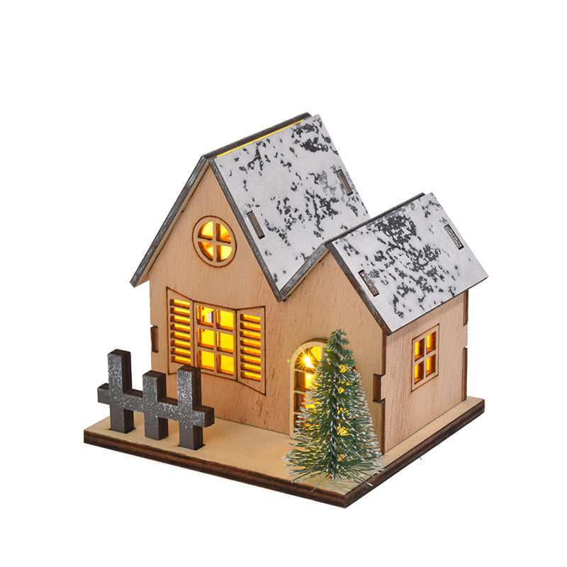 Illuminated wooden Christmas house with LED