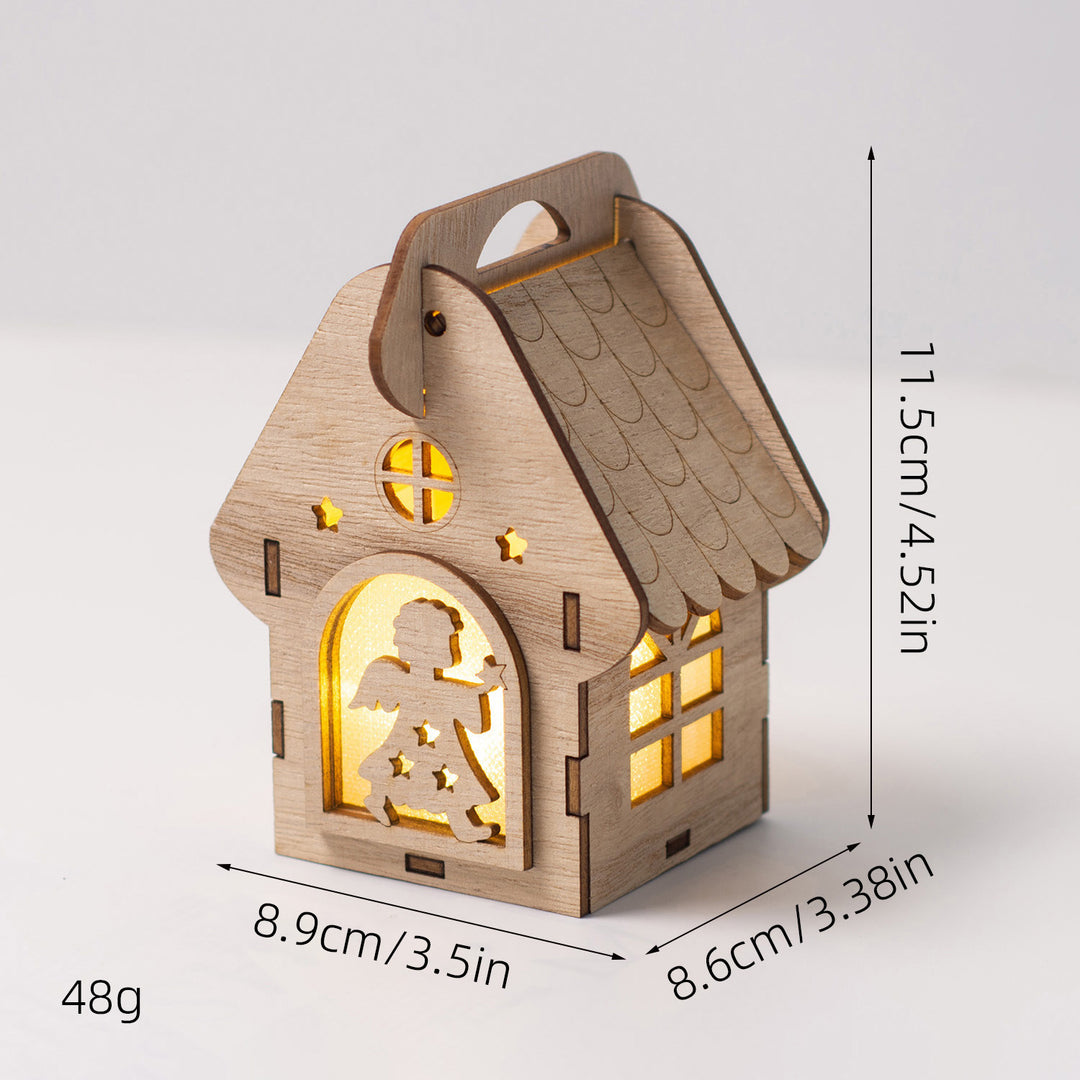 Illuminated wooden house as Christmas decoration
