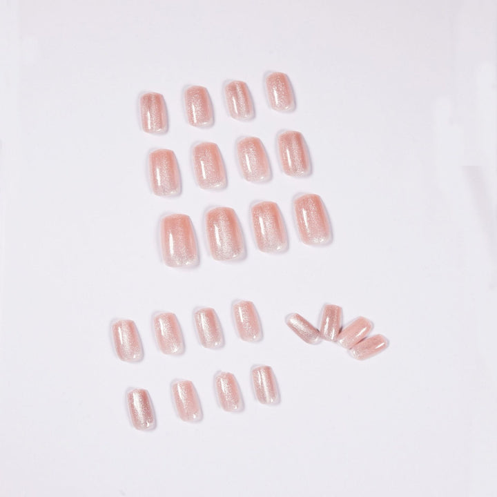 Artful nail art with a gentle glitter effect and elegant finish Kalsten