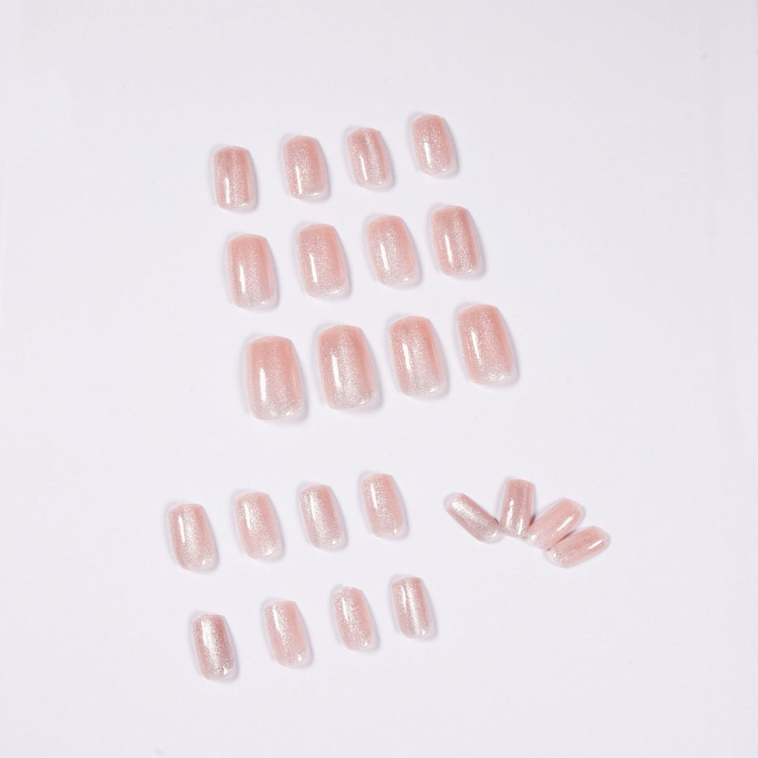 Artful nail art with a gentle glitter effect and elegant finish Kalsten
