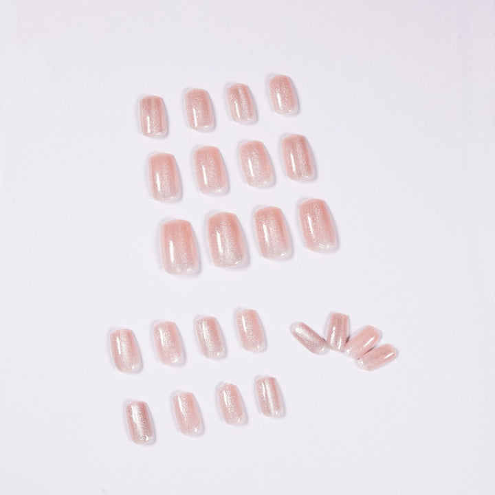 Artful nail art with a gentle glitter effect and elegant finish Kalsten