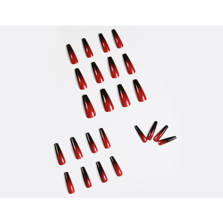 Artificial nail art in elegant stiletto design with glossy gradient colors Kalsten