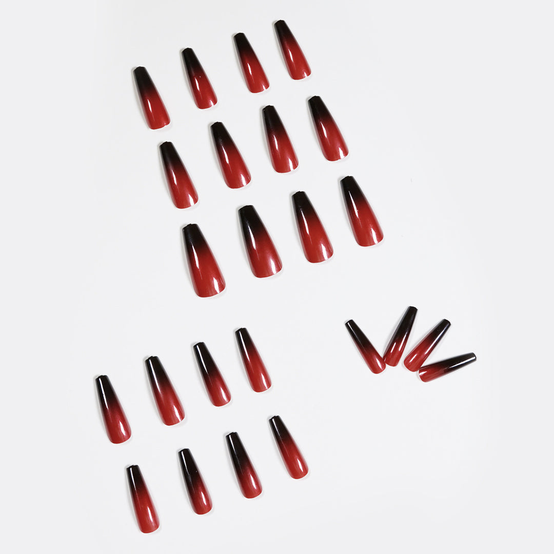 Artificial nail art in elegant stiletto design with glossy gradient colors Kalsten