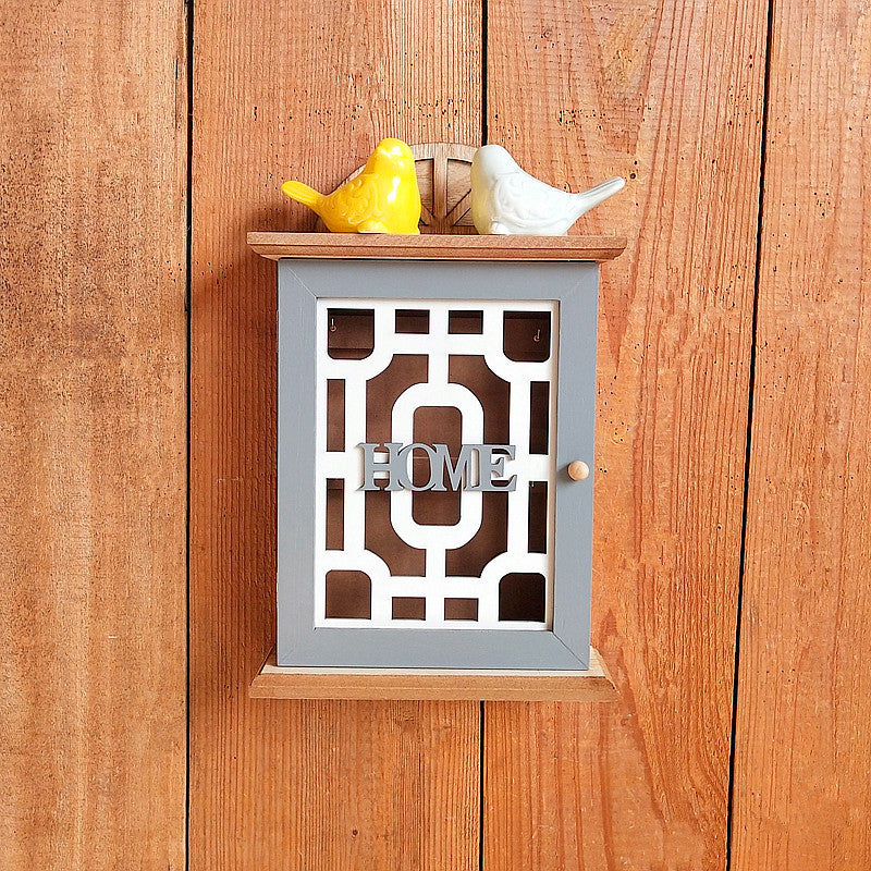Wall-mounted home organizer with decorative design