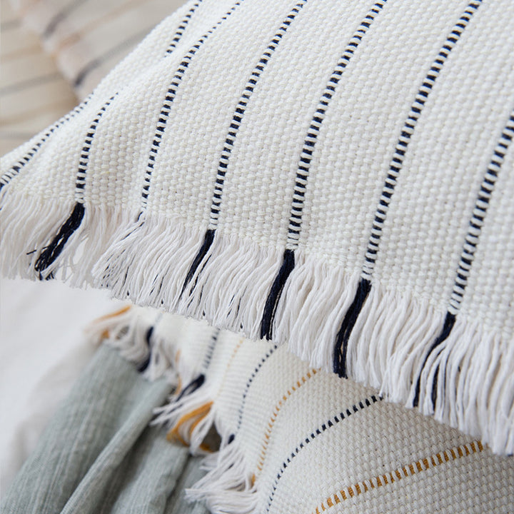 Square woven cushion cover with fine stripes and fringe border Kalsten
