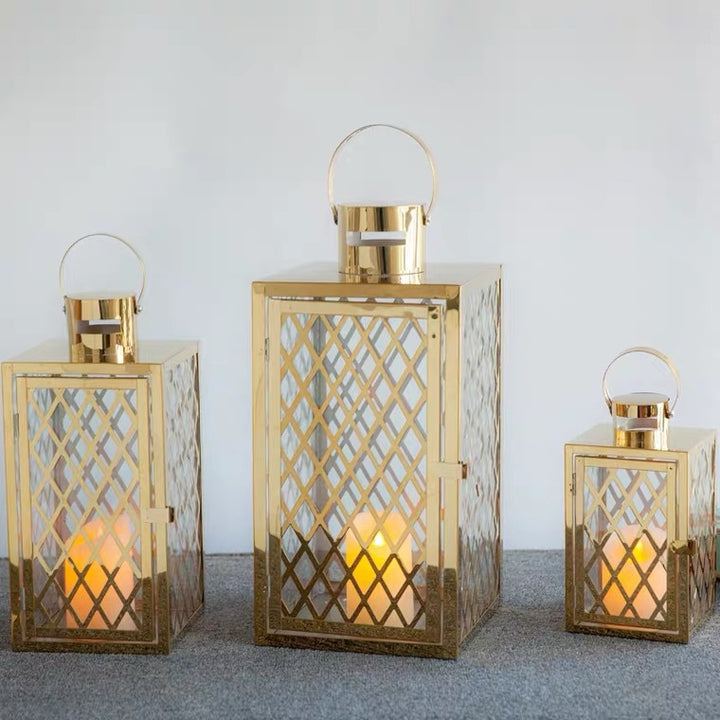 Modern Polished Lattice Metal Lantern Collection with Hinged Door and Top Loop Handle Kalsten