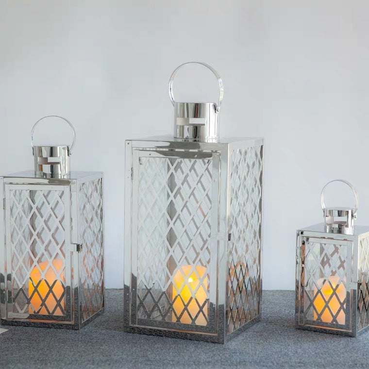 Modern Polished Lattice Metal Lantern Collection with Hinged Door and Top Loop Handle Kalsten