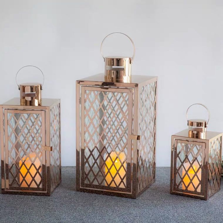 Modern Polished Lattice Metal Lantern Collection with Hinged Door and Top Loop Handle Kalsten