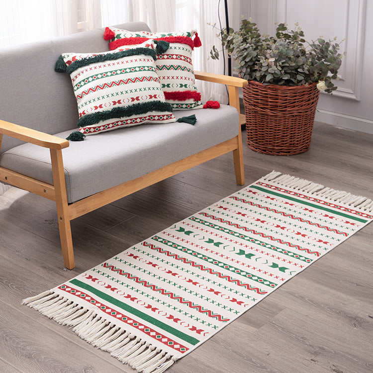 Flat-woven runner rug with Nordic Christmas pattern, tassels and cotton blend Kalsten