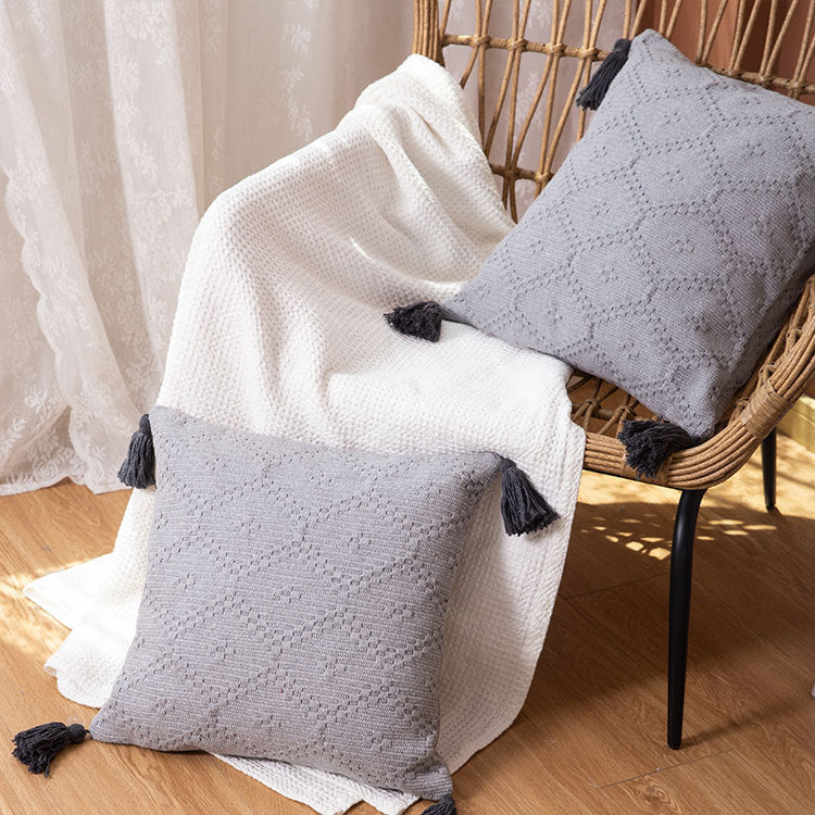 Square Boho cushion cover made of handwoven cotton with textured relief weaving and four tassels Kalsten