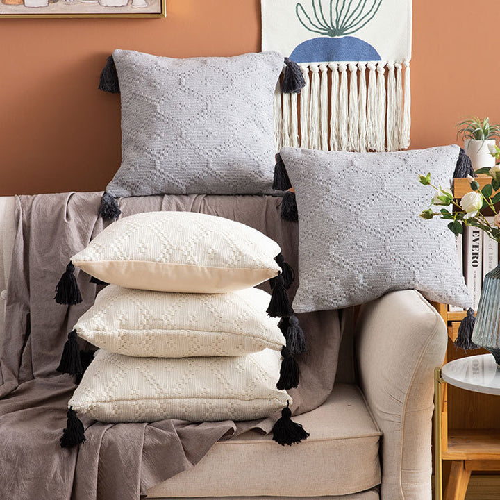 Square Boho cushion cover made of handwoven cotton with textured relief weaving and four tassels Kalsten